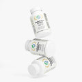 Kasivit Radiant Glow Complex Hair Skin and Nail capsules in white bottles stacked together